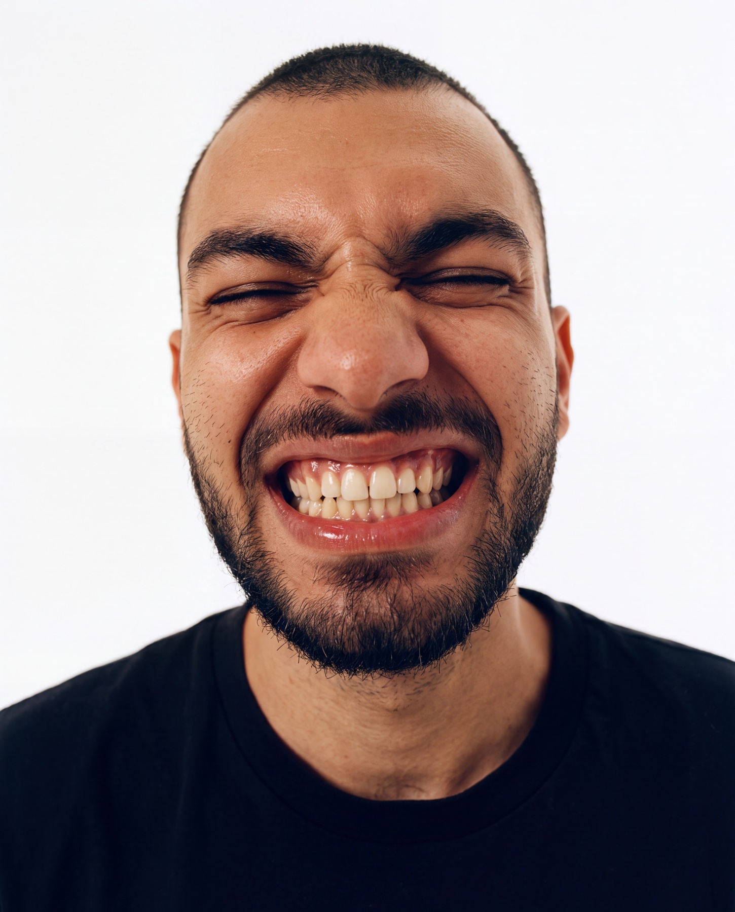 A playful close-up portrait of Sotiris Sotiriou